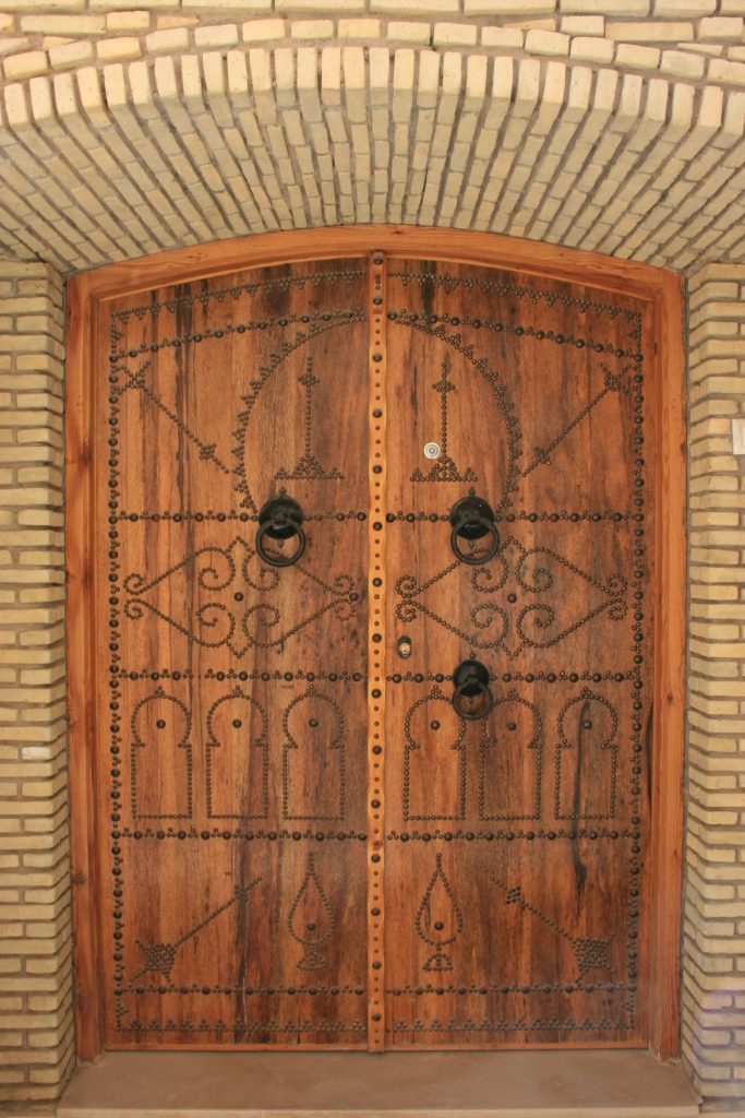 Another doorway. Three knockers for different family members.
