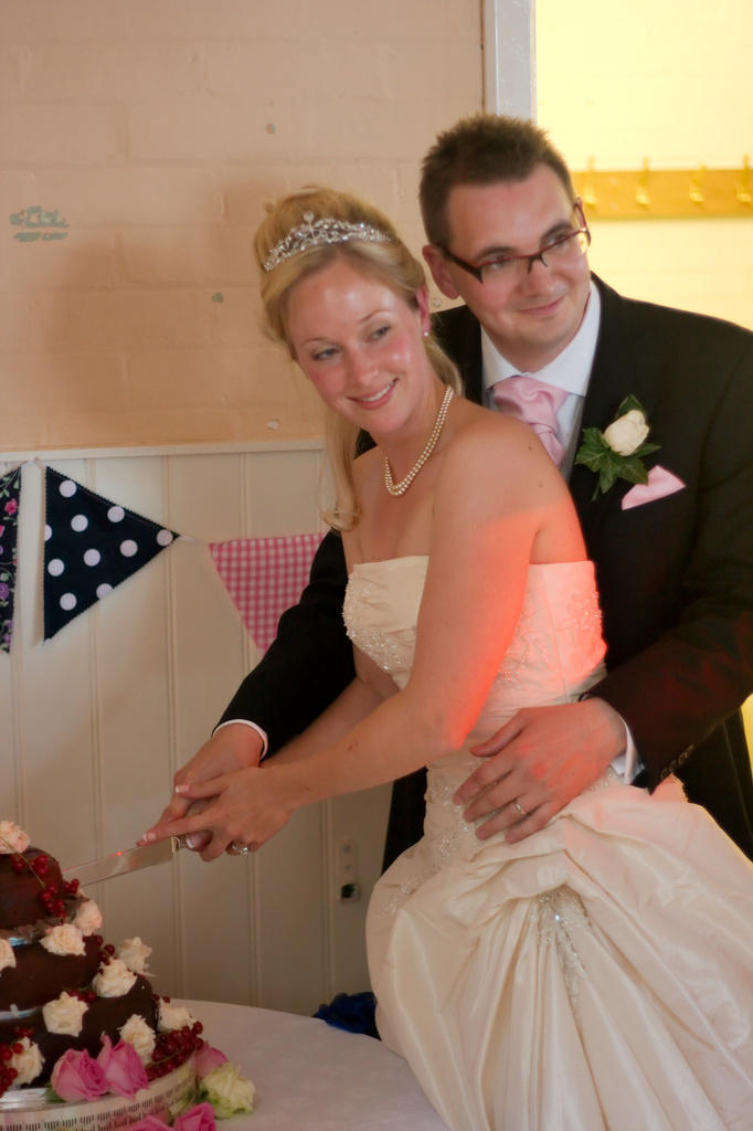 Cutting the cake.