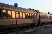 The 5am sunrise reflected in the train windows
