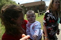 Sigh. Rachel holding a baby.