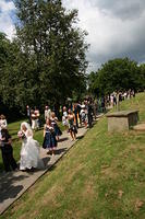 Procession leads out.